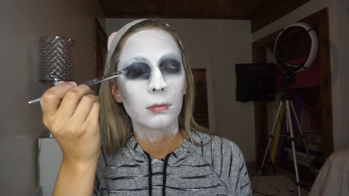 how to do super spooky makeup for a terrifying valak the nun costume, Building up black around the eyes