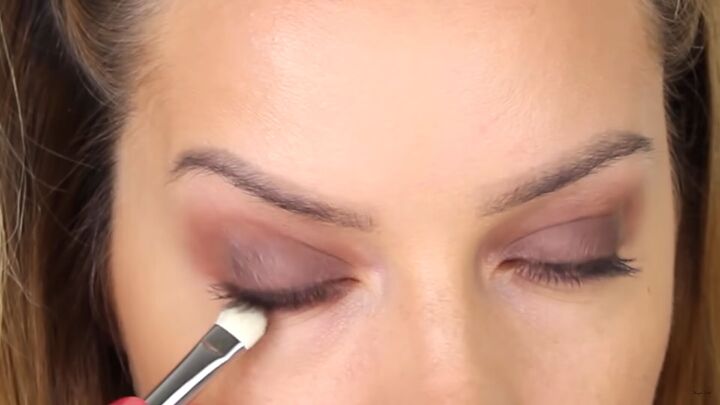 how to do intricate masquerade mask makeup with liquid eyeliner, Applying eyeshadow under the lower lashline