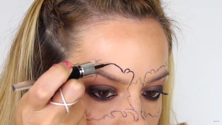 how to do intricate masquerade mask makeup with liquid eyeliner, Masquerade mask makeup tutorial