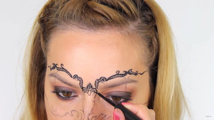how to do intricate masquerade mask makeup with liquid eyeliner, Doing masquerade mask makeup