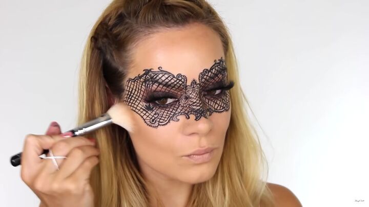 how to do intricate masquerade mask makeup with liquid eyeliner, Applying bronzer to the cheekbones
