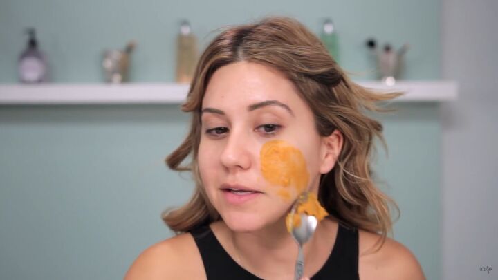 this fun pumpkin pie face mask recipe is super easy to make, Applying the pumpkin pie face mask