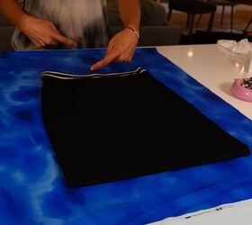 this fun no sew pretty woman costume diy is super easy to make, Tracing the skirt on the blue fabric