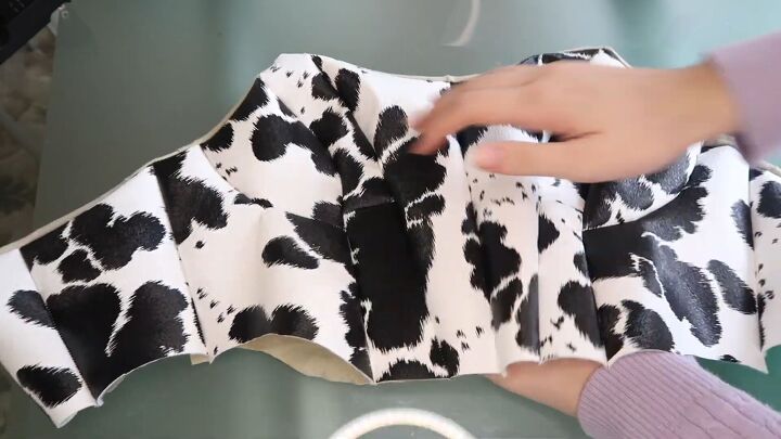 how to make a cute diy cow costume bustier for halloween, Pinning the lining to the cow bustier top