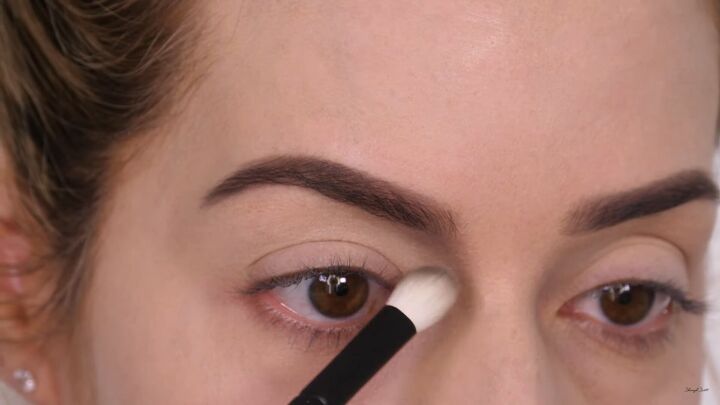 how to do fun diy cruella de vil makeup for halloween, Applying black eyeshadow below the brow