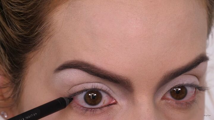how to do fun diy cruella de vil makeup for halloween, Line eyes with black eyeliner