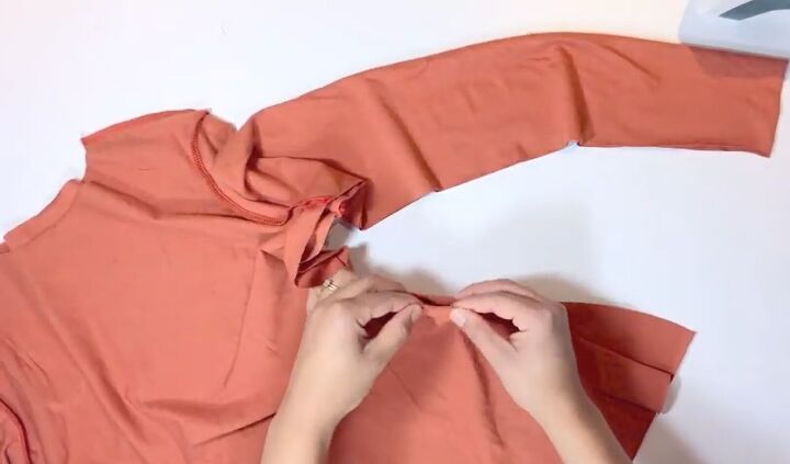 ready for a fun fall sewing project here s how to make a turtleneck, Lining up the side seams of the turtleneck