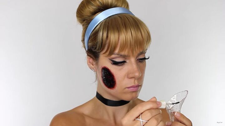 how to do scary halloween cinderella makeup with a glass slipper wound, Applying glue to the glass slipper