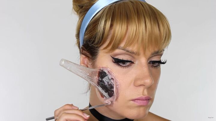 how to do scary halloween cinderella makeup with a glass slipper wound, Applying sculpt gel to build up the wound