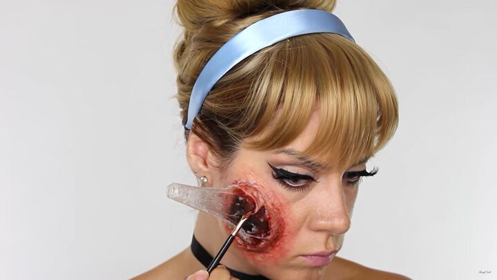 how to do scary halloween cinderella makeup with a glass slipper wound, Applying flesh tones to the edge of the tears