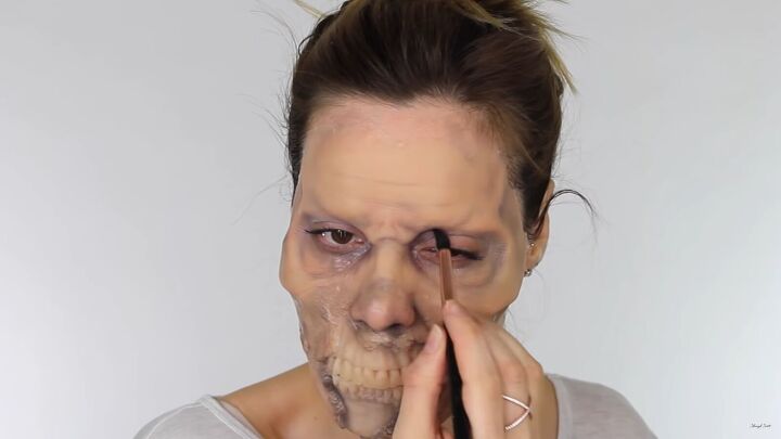 looking for a fun halloween look try this chilling zombie sfx makeup, Applying red around the eyes