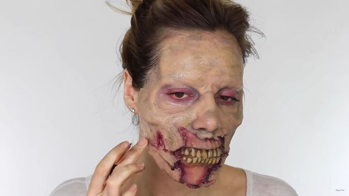 looking for a fun halloween look try this chilling zombie sfx makeup, Applying red into the cracked areas