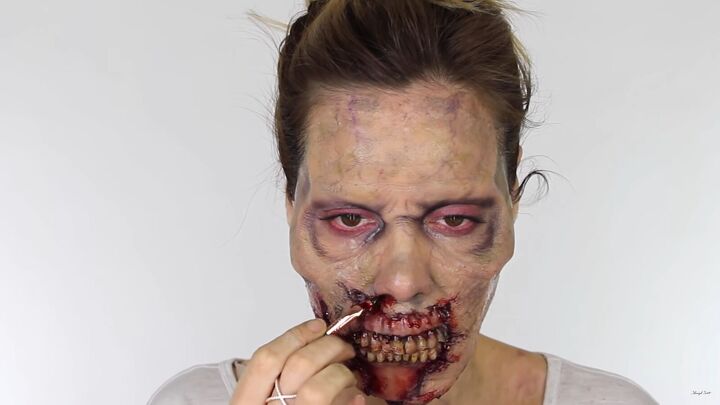 looking for a fun halloween look try this chilling zombie sfx makeup, Applying fake blood