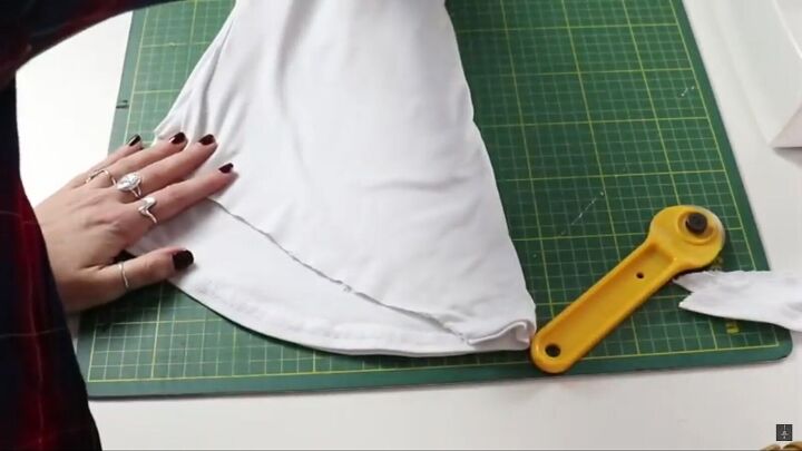 how to make a fun diy starlight costume from the boys this halloween, Folding and cutting the t shirt fabric