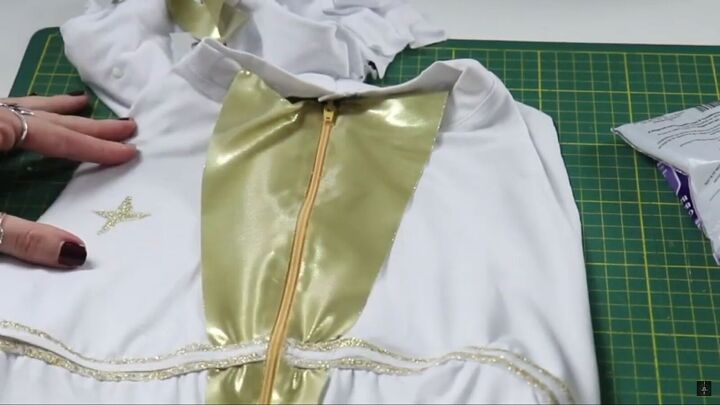 how to make a fun diy starlight costume from the boys this halloween, Painting gold stars on the Starlight costume