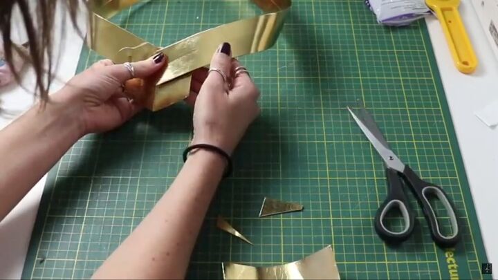 how to make a fun diy starlight costume from the boys this halloween, Gluing the ends of the gold belt
