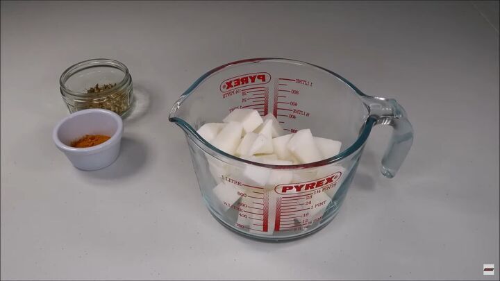 simple diy turmeric soap recipe with rich moisturizing goats milk, Cutting up the goats milk soap base