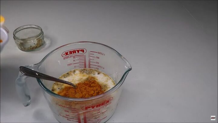simple diy turmeric soap recipe with rich moisturizing goats milk, Adding a teaspoon of turmeric to the mixture