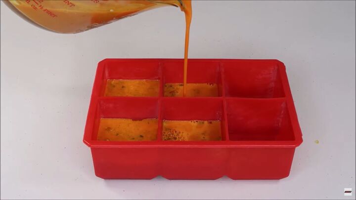 simple diy turmeric soap recipe with rich moisturizing goats milk, Pouring soap mixture into the soap molds