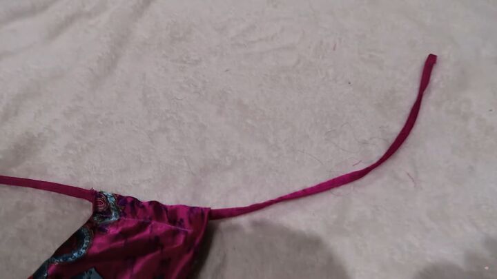 how to turn an old silky shirt into a cute diy plunge halter top, Feeding the straps through the tunnels