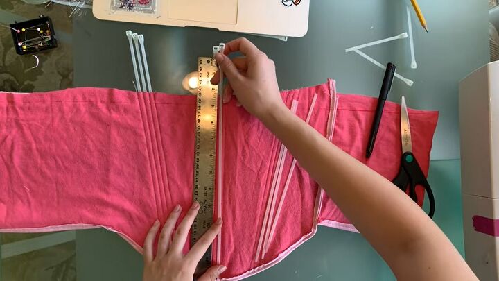 how to make a pretty diy corset tank top with old tees zip ties, Inserting zip ties into the corset top