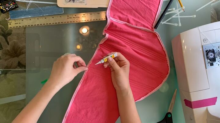 how to make a pretty diy corset tank top with old tees zip ties, Supergluing the zip tie openings