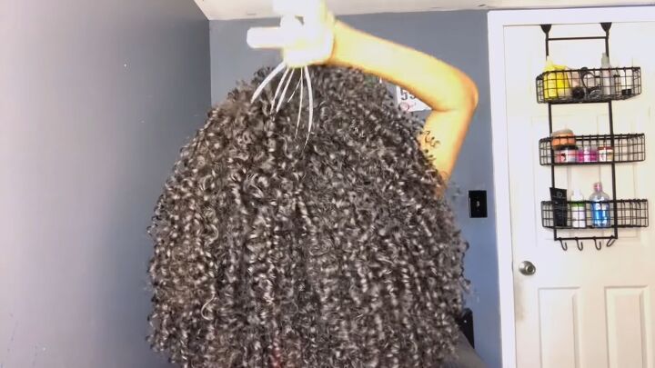 12 simple steps to the perfect wash go for type 3 natural hair, Massaging scalp with a head massager