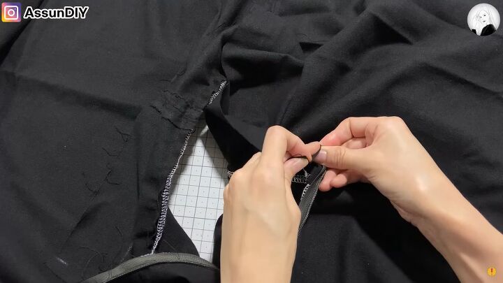 how to sew a high low skirt that can also be worn as an elegant cape, Folding and pinning the facing to the zipper