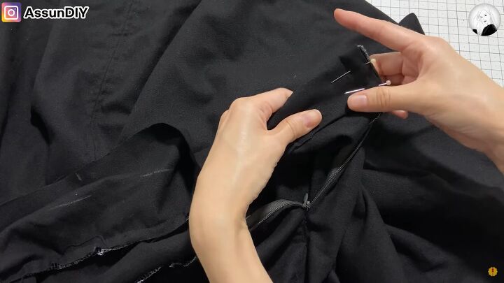 how to sew a high low skirt that can also be worn as an elegant cape, Folding the facing around the waist