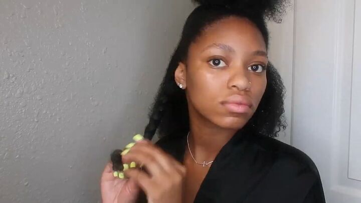 how to easily do a sleek top knot bun on natural hair, Twisting hair in three sections