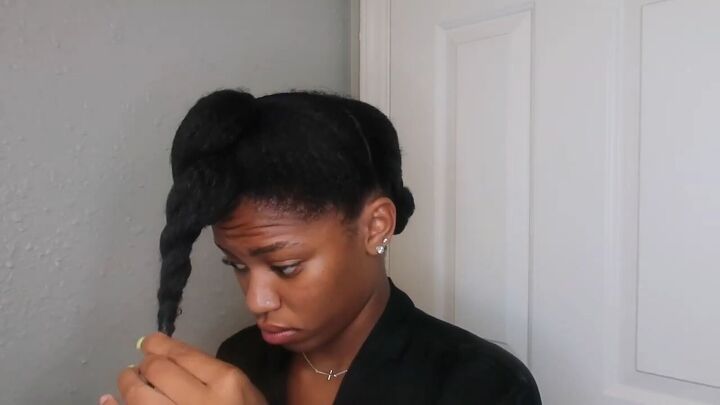 how to easily do a sleek top knot bun on natural hair, Twisting hair and securing with a bobby pin