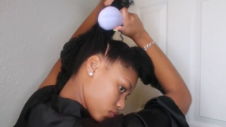 how to easily do a sleek top knot bun on natural hair, Brushing hair upwards