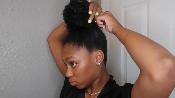 how to easily do a sleek top knot bun on natural hair, Wrapping the ends of hair around