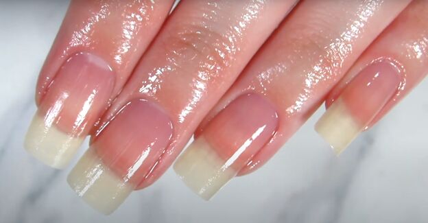 how to take care of long nails keeping natural nails long strong, Applying cuticle oil to nails