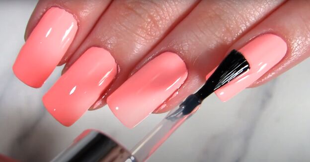 how to take care of long nails keeping natural nails long strong, Applying a clear top coat of nail polish