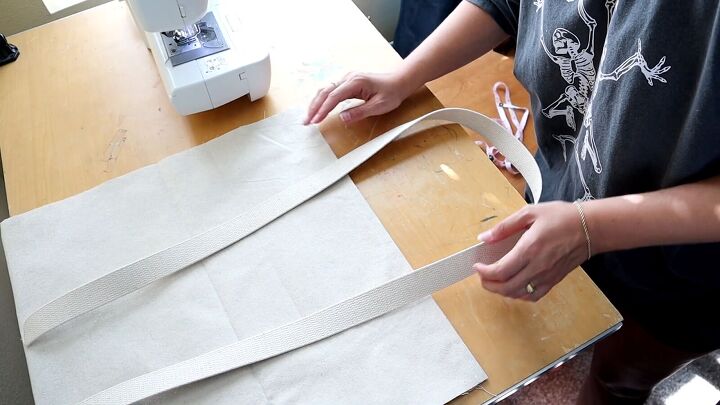 how to make a market tote bag with an adorable embroidered design, Sewing straps for the bag
