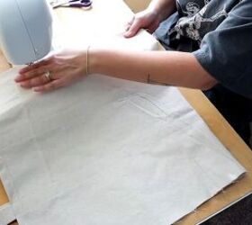 how to make a market tote bag with an adorable embroidered design, Sewing the side seams of the bag