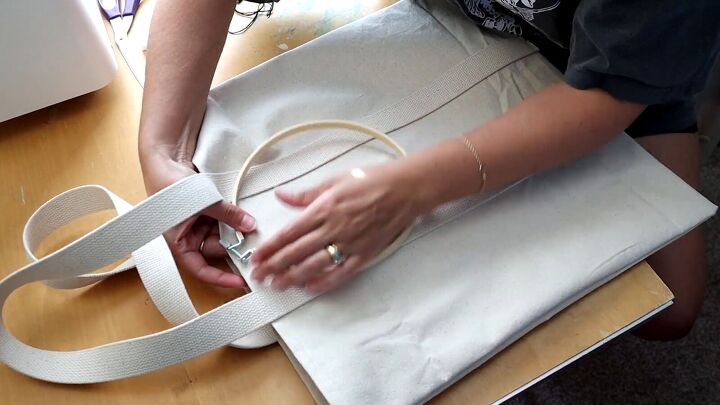 how to make a market tote bag with an adorable embroidered design, Placing the embroidery hoop