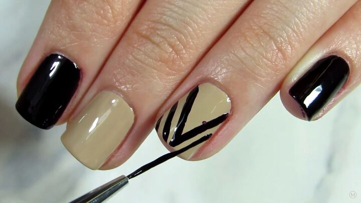 super easy stud nail art designs you can try at home, Painting black stripes on the beige polish