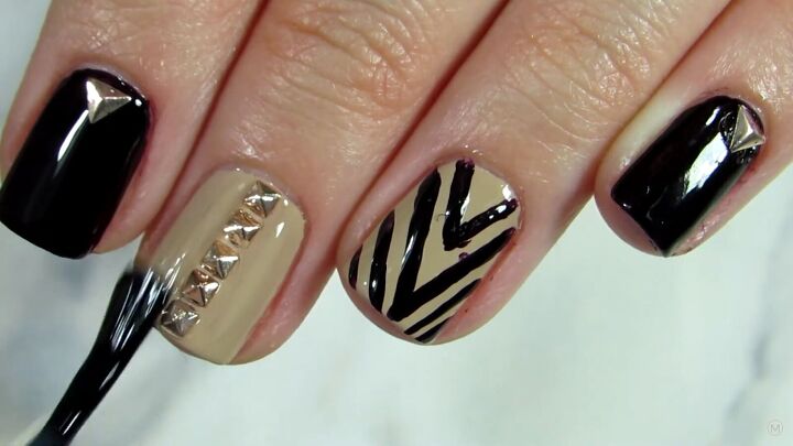 super easy stud nail art designs you can try at home, Applying a top coat over the stud nail art