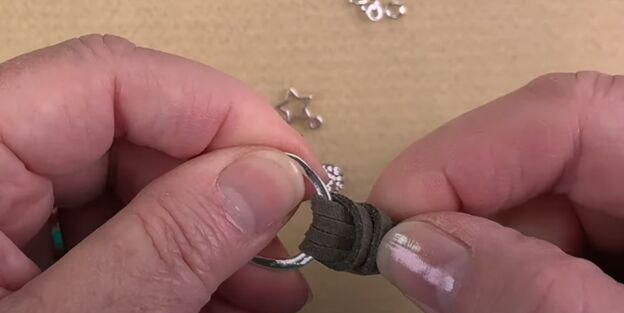 how to make a lariat necklace that is elegant easily adjustable, Tightening the knot on the ring