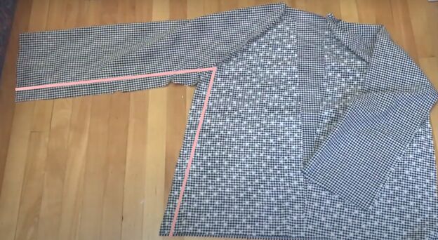 how to make a cute custom raincoat from an old coat gingham fabric, Sewing the side seams of the raincoat