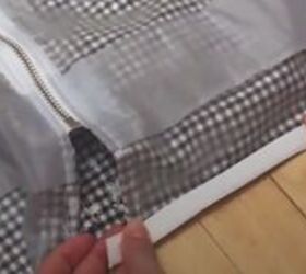how to make a cute custom raincoat from an old coat gingham fabric, Hemming the raw edges