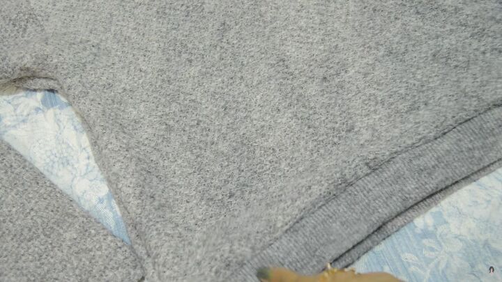 how to make a cute cozy knit sweater from scratch in 5 simple steps, Sewn waistband on the knit sweater
