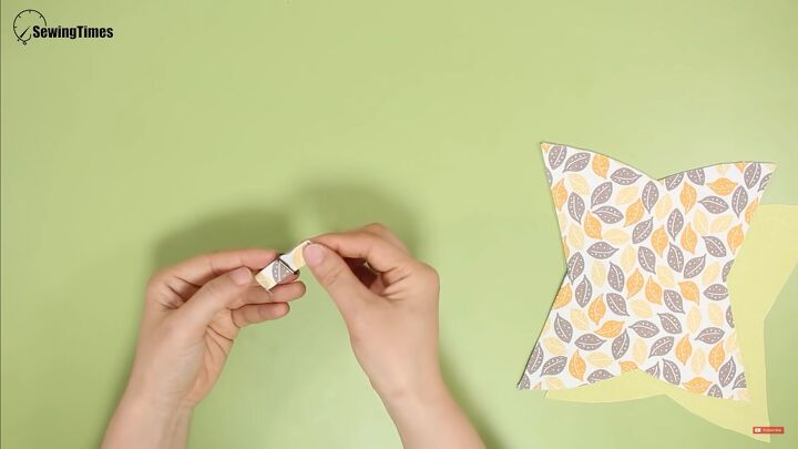 this adorable dumpling style diy coin purse is the perfect gift idea, Pulling the D ring through the tab
