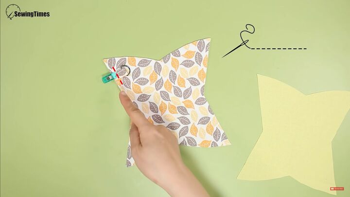 this adorable dumpling style diy coin purse is the perfect gift idea, Sewing the tab to the fabric
