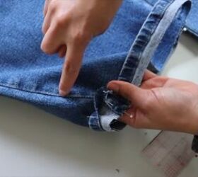 jeans too long here s how to hem flared jeans keep the original hem, Lining up the front and back of the jeans