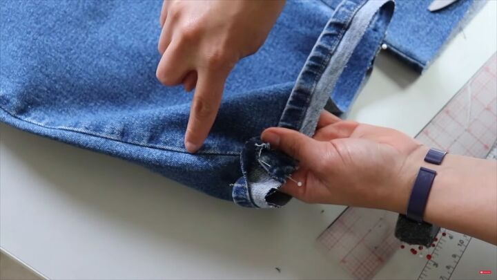 jeans too long here s how to hem flared jeans keep the original hem, Lining up the front and back of the jeans