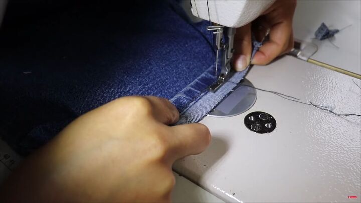 jeans too long here s how to hem flared jeans keep the original hem, Using a zipper foot to hem the flared jeans