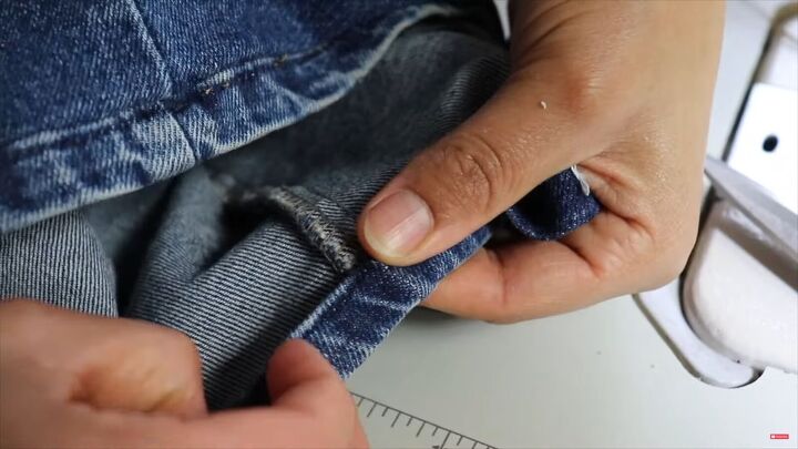 jeans too long here s how to hem flared jeans keep the original hem, Folding the hem back up